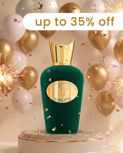 Vibrato perfume bottle with gold cap and green body, surrounded by gold and white balloons, celebrat.