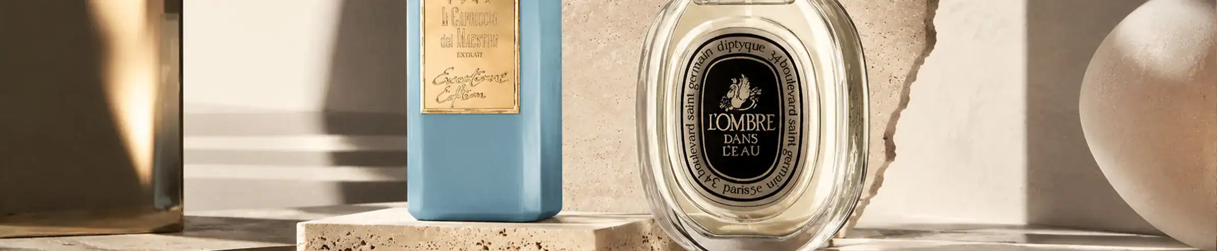 Elegant Lombre Paris Eclat perfume bottle with blue packaging and minimalist design.
