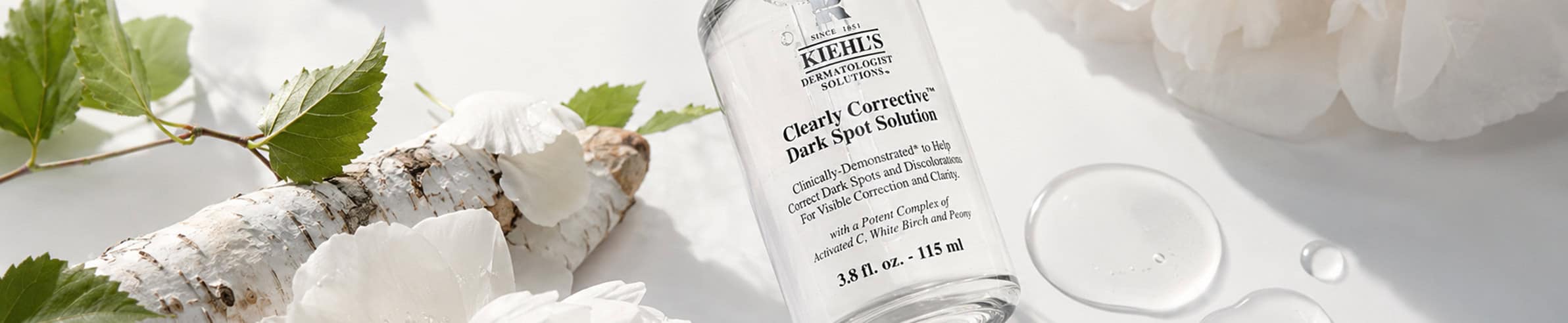 Kiehl's Clearly Corrective Dark Spot Solution - Skincare serum for brightening.