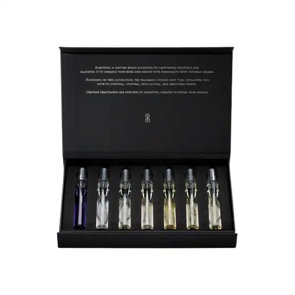 Luxury perfume sample set in elegant black box with six vials.
