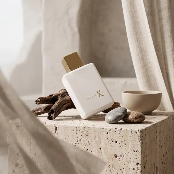 Ella K Musc K Eau de Parfum bottle with minimalist design and gold cap.