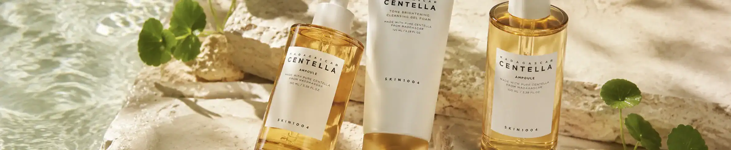 Centella skincare collection - luxurious skincare set with gold accents.