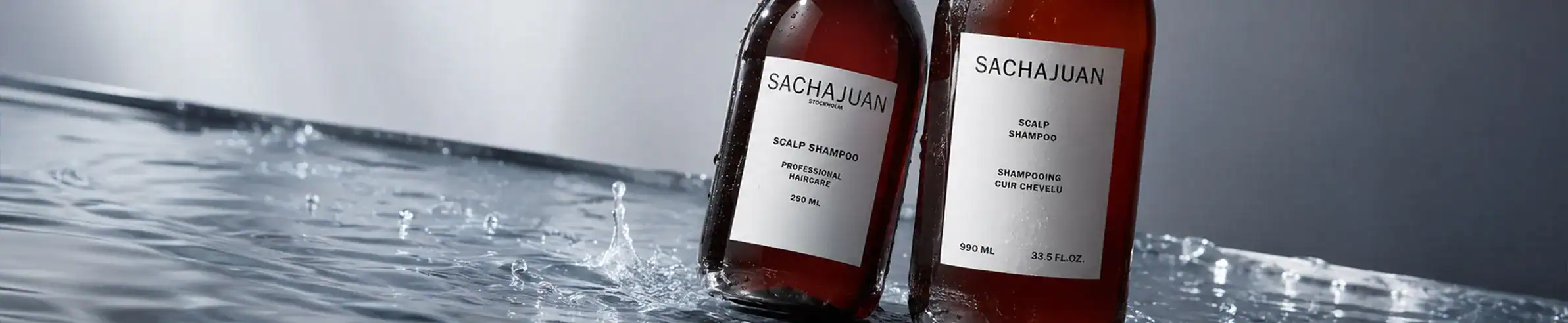 SachaJuan hair care bottles - Premium professional shampoo and conditioner set.