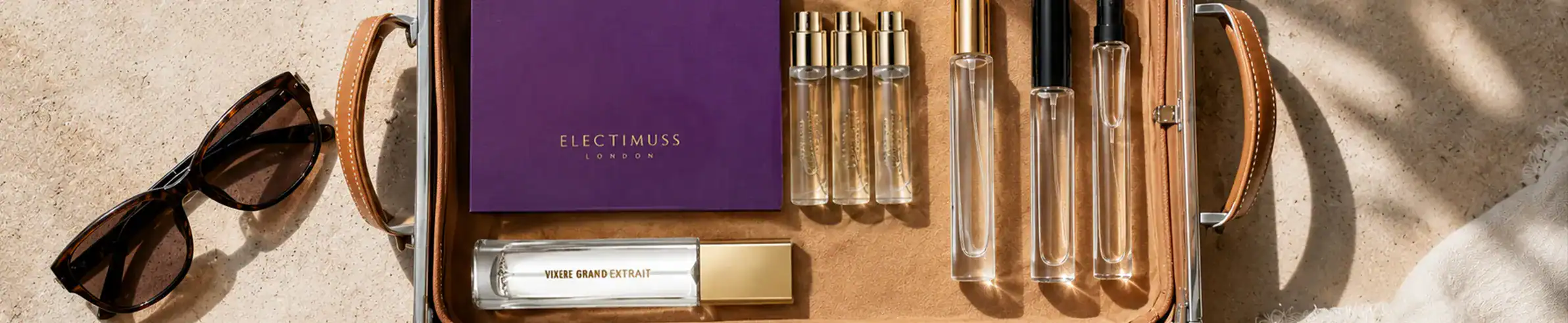 Electimuss luxury skincare set with glass bottles and purple box at Beautinow.