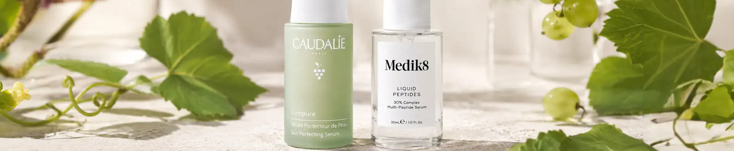 CaldeLuxe and Medik8 skincare bottles - luxury skincare products.