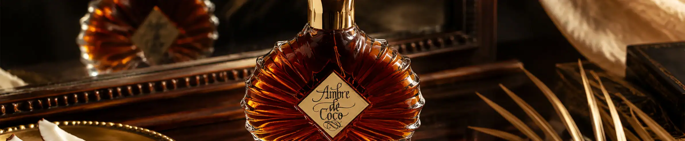 A perfume bottle with a rich amber color and elegant design, featuring a diamond-shaped label.