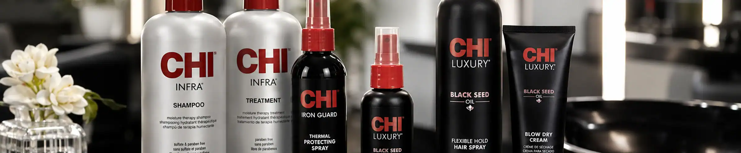 CHI Infra Shampoo and Treatment bottles - Professional hair care products.