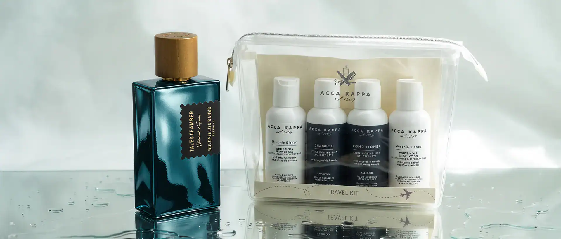 Acca Kappa travel kit with skincare and grooming products, luxury travel essentials.